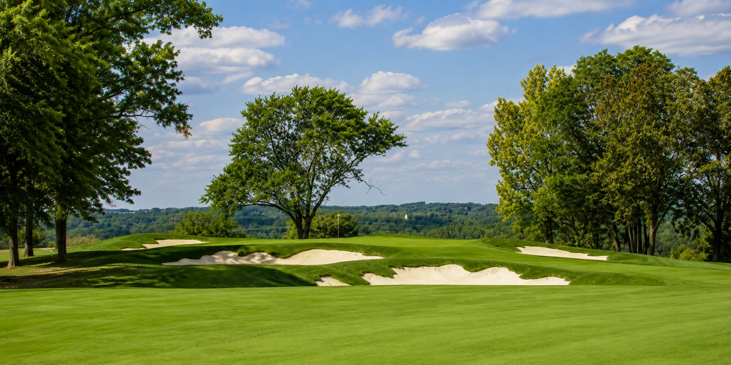 The view over Cook County from the 1tth green looks more like northern Michigan than northern Illinois. (After you extract yourself from one of those bunkers, take a moment to enjoy the view!)